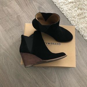 Black Cow split sued wedge booties